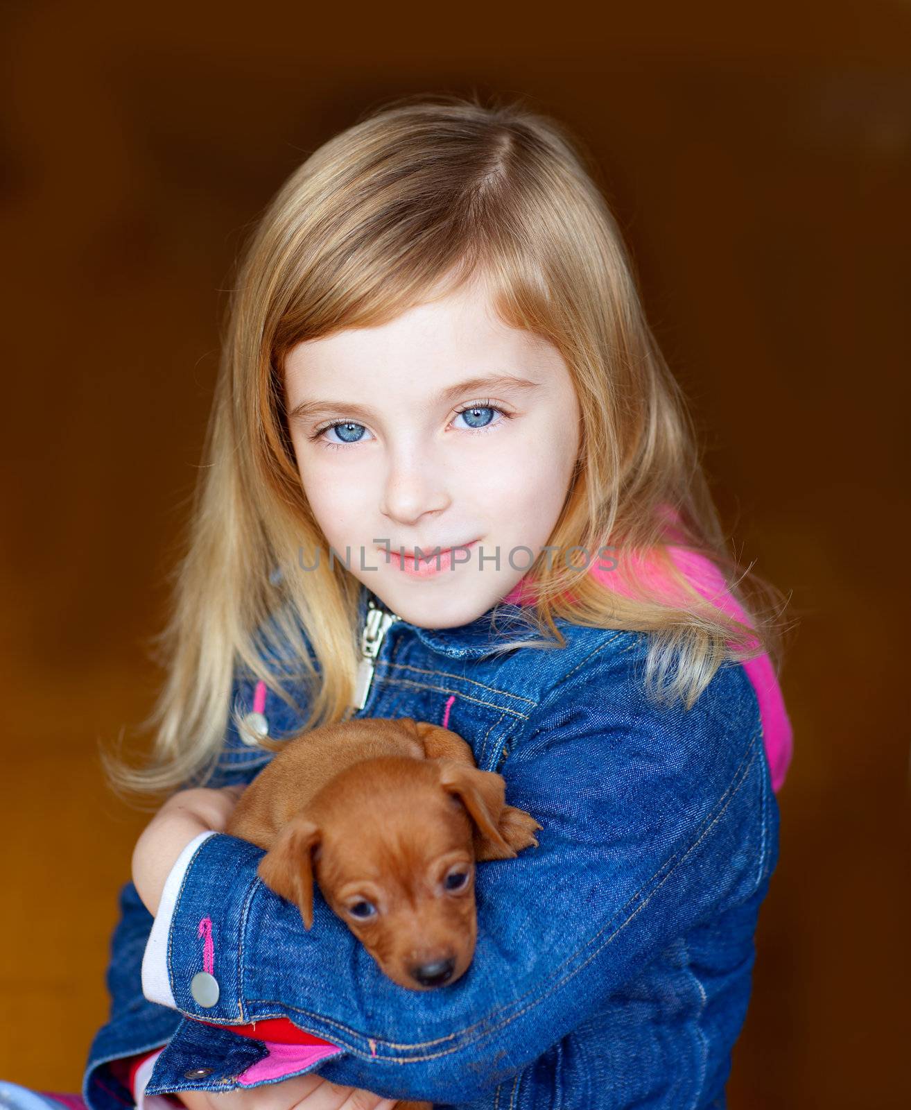 mini pinnscher puppy mascot with blond kid little girl