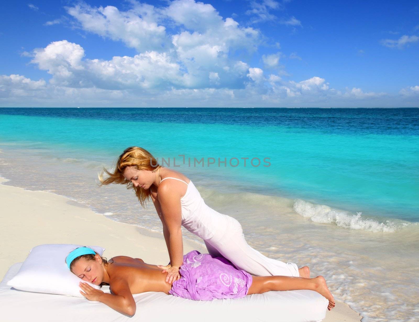Caribbean beach massage shiatsu waist pressure woman outdoor paradise