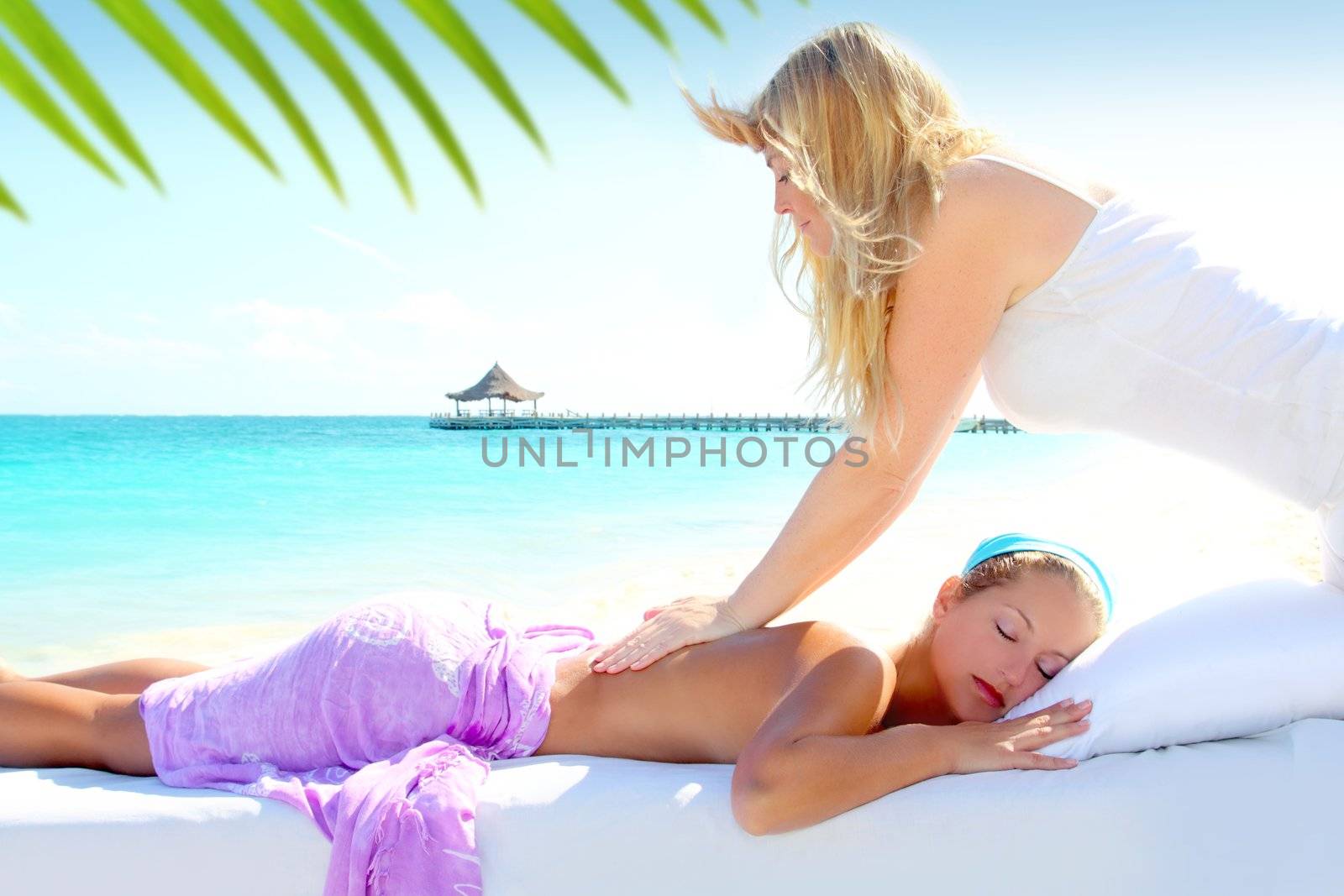 Caribbean turquoise beach chiropractic massage therapy woman