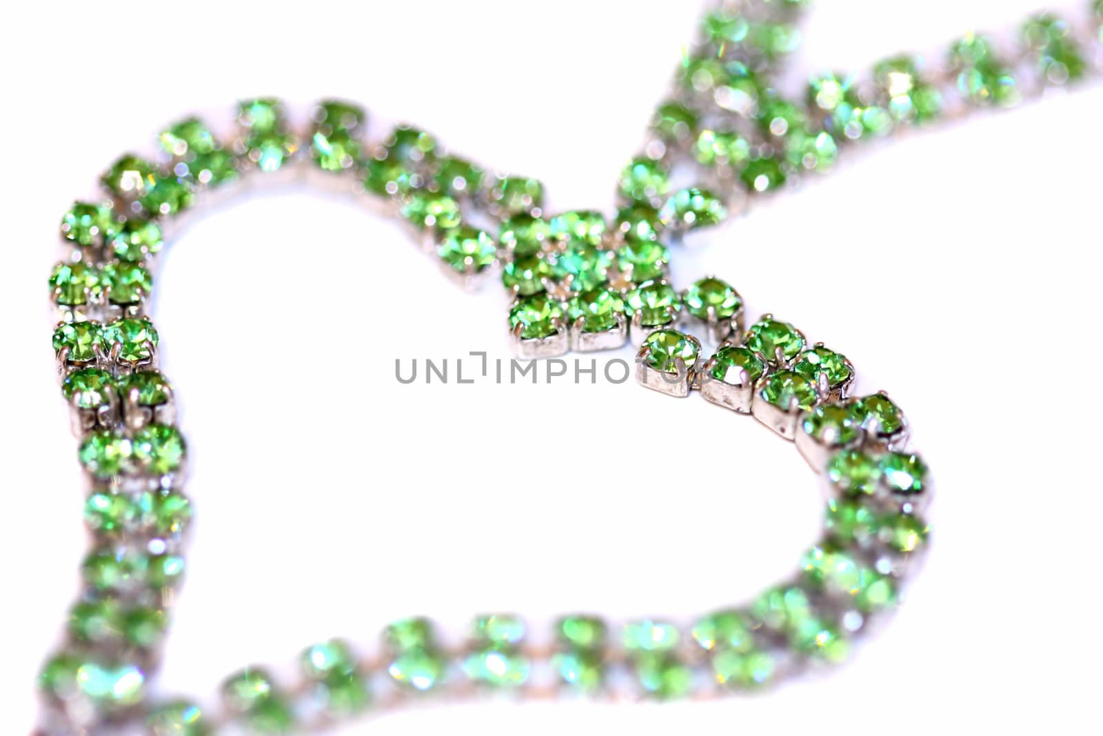 Beautiful chain with diamonds isolated on white background. Close-up.