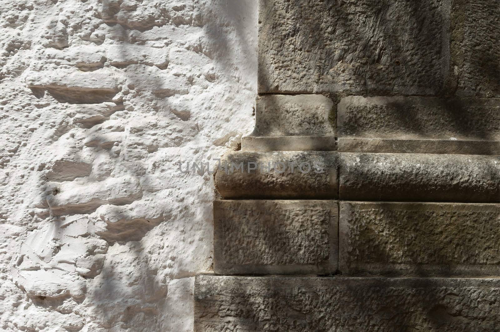 Whitewashed wall and stone architectural detail, Portugal