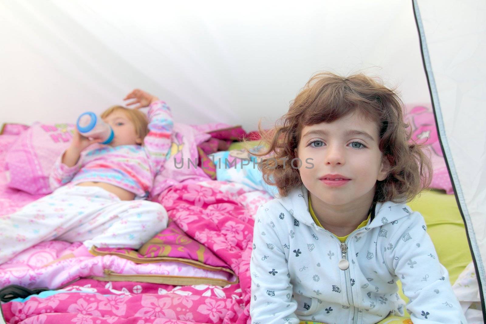 girls inside camping tent sisters happy two little friends