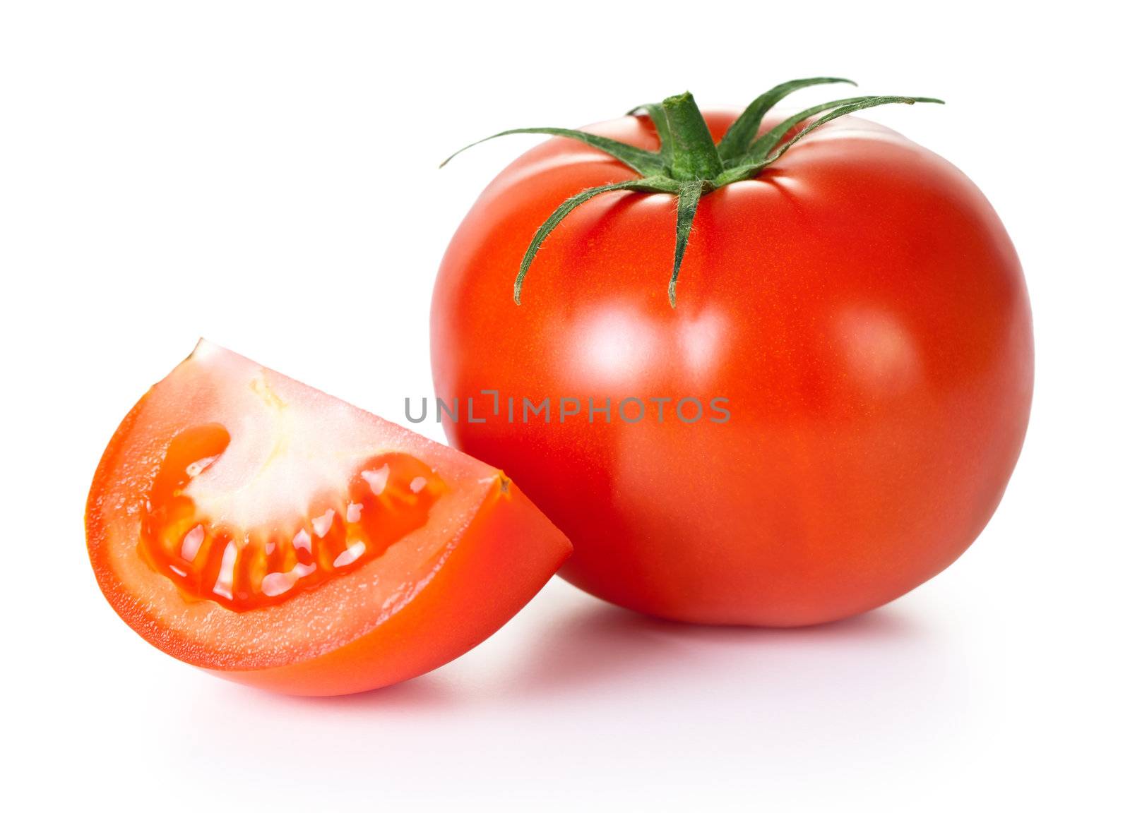 Fresh tomato vegetable on white background. Studio macro shot