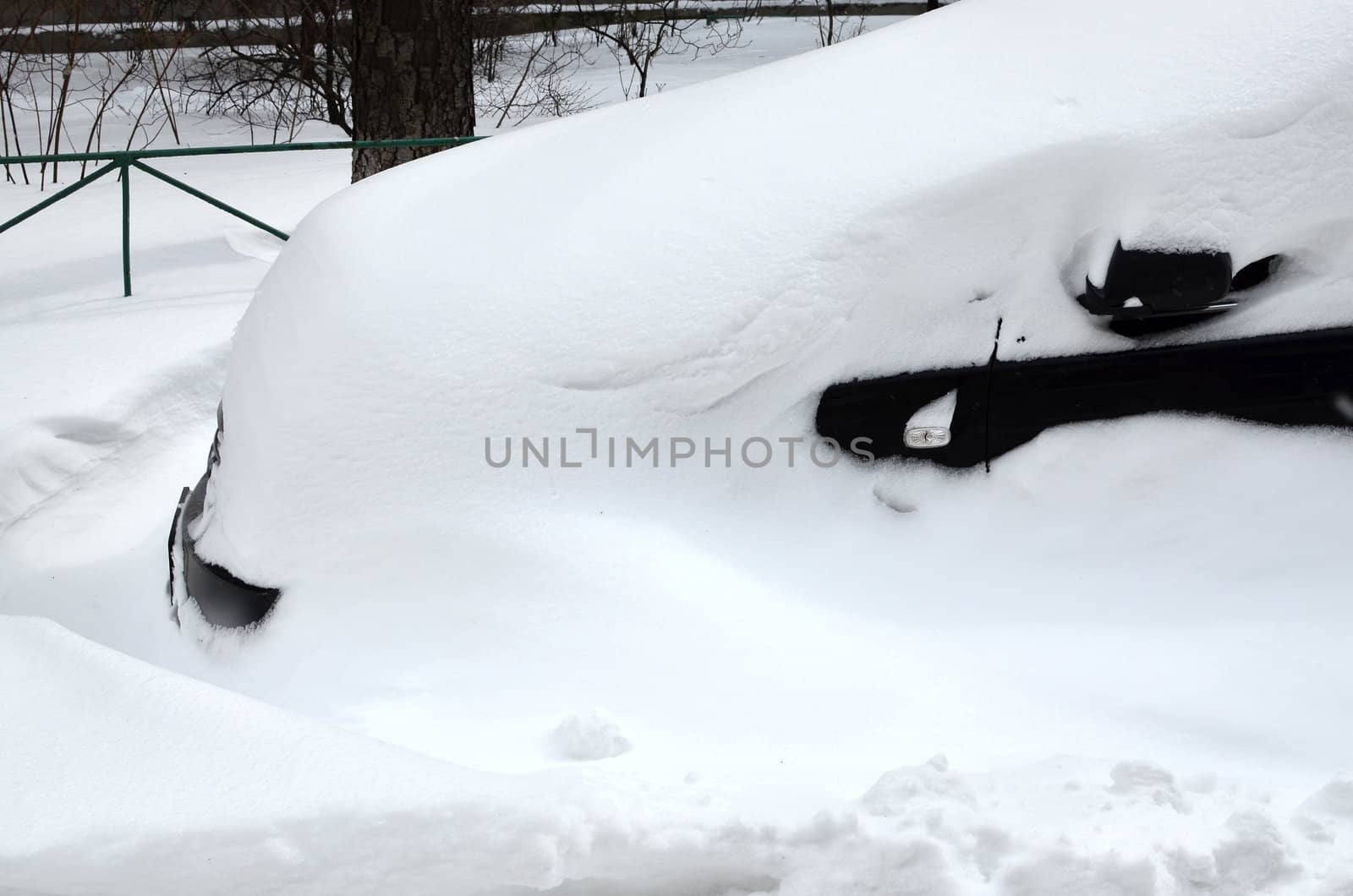 Car under snowdrift by DNKSTUDIO