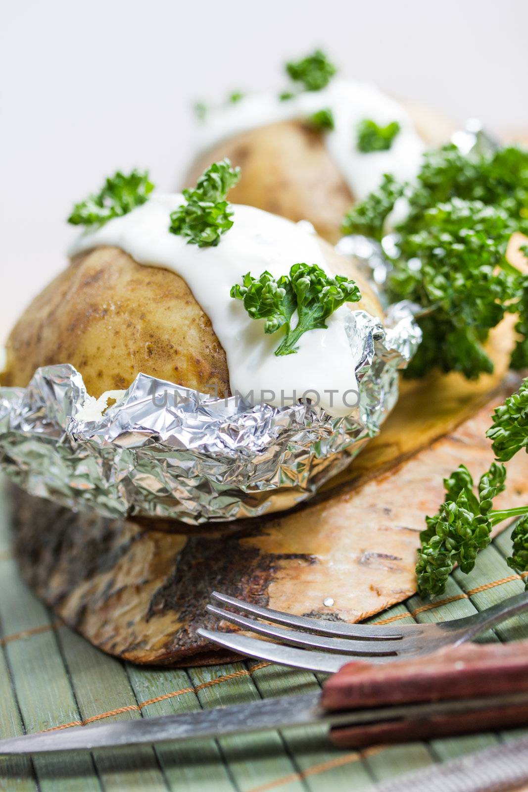 fresh baked potatoe with sour cream