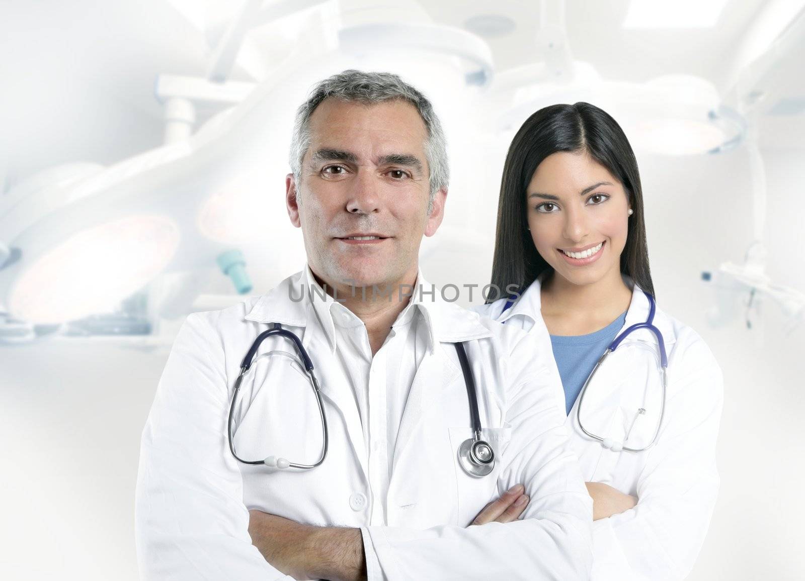 expertise gray hair doctor beautiful nurse in hospital white corridor