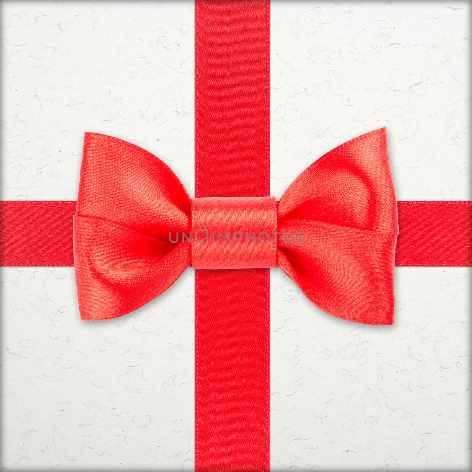 red bow and ribbon over wrapped gift