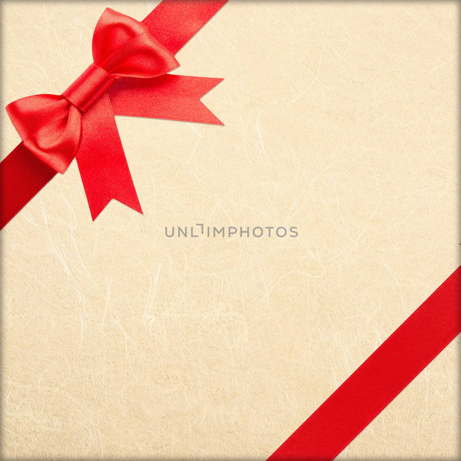 red bow and ribbon over wrapped gift