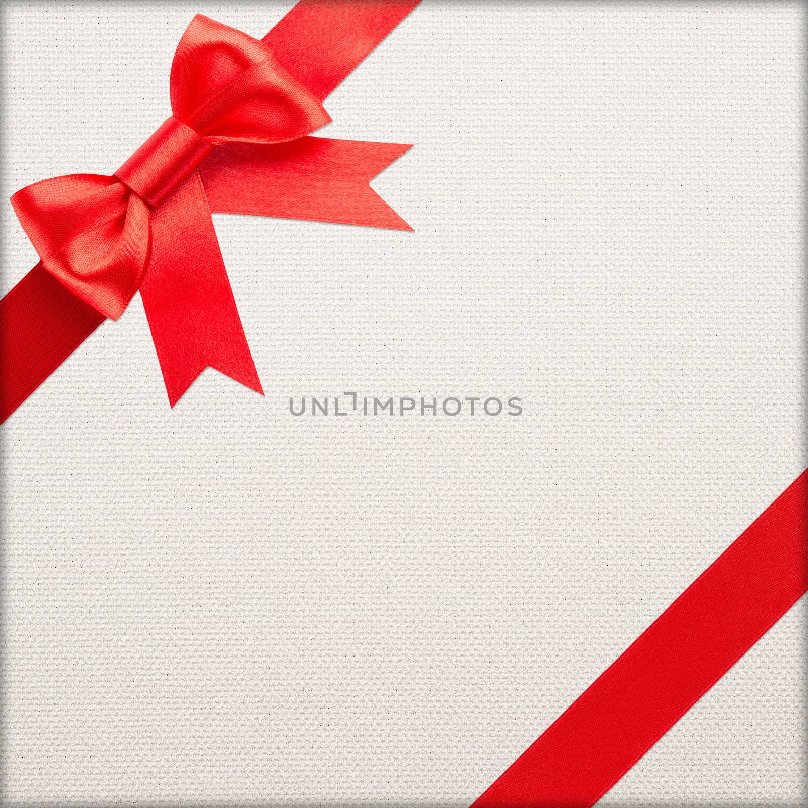 red bow and ribbon over wrapped gift