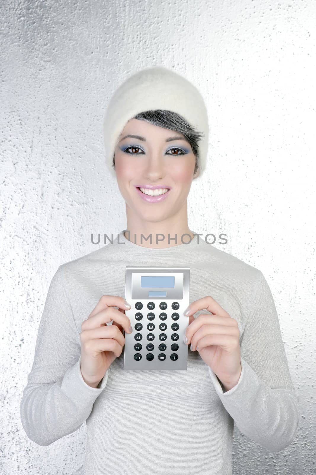 hapy futuristic fashion winter woman holding calculator smiling silver background