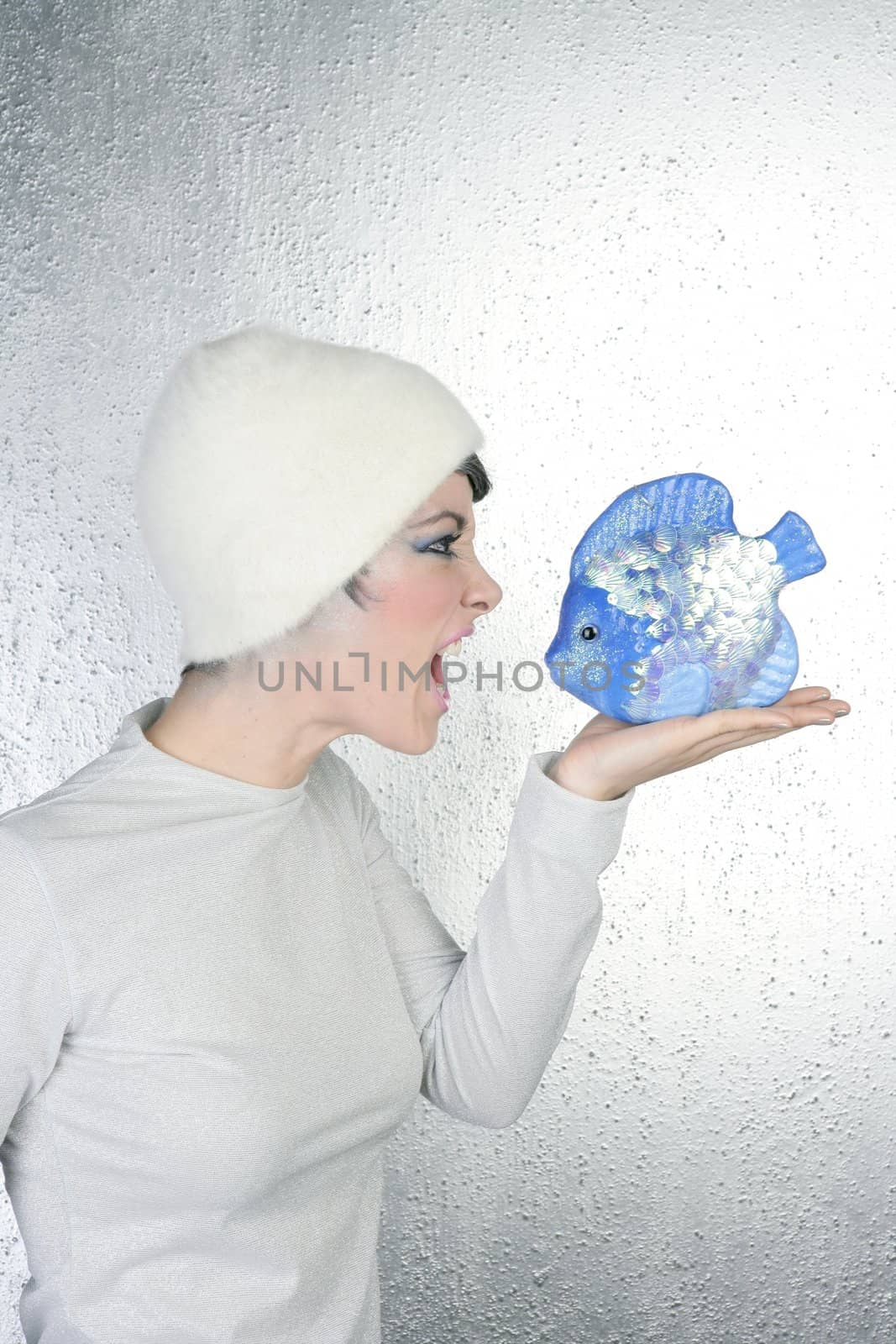 angry futuristic fashion woman shout to blue fish by lunamarina