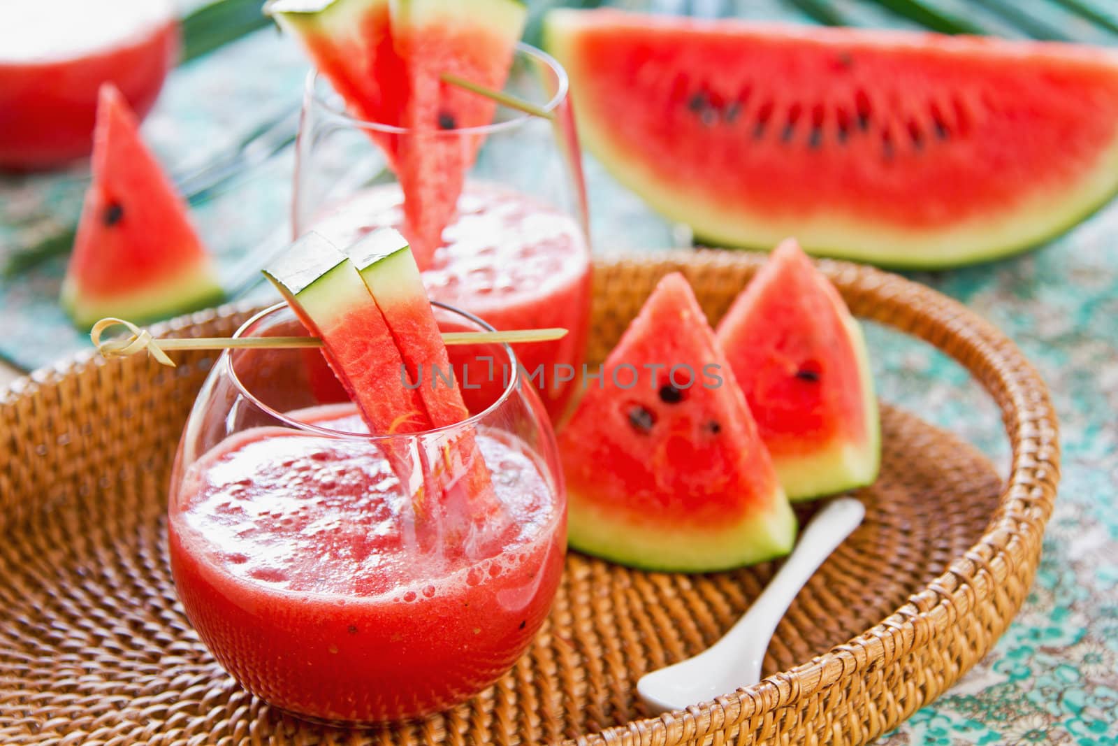 Watermelon juice with some pieces of watermelon