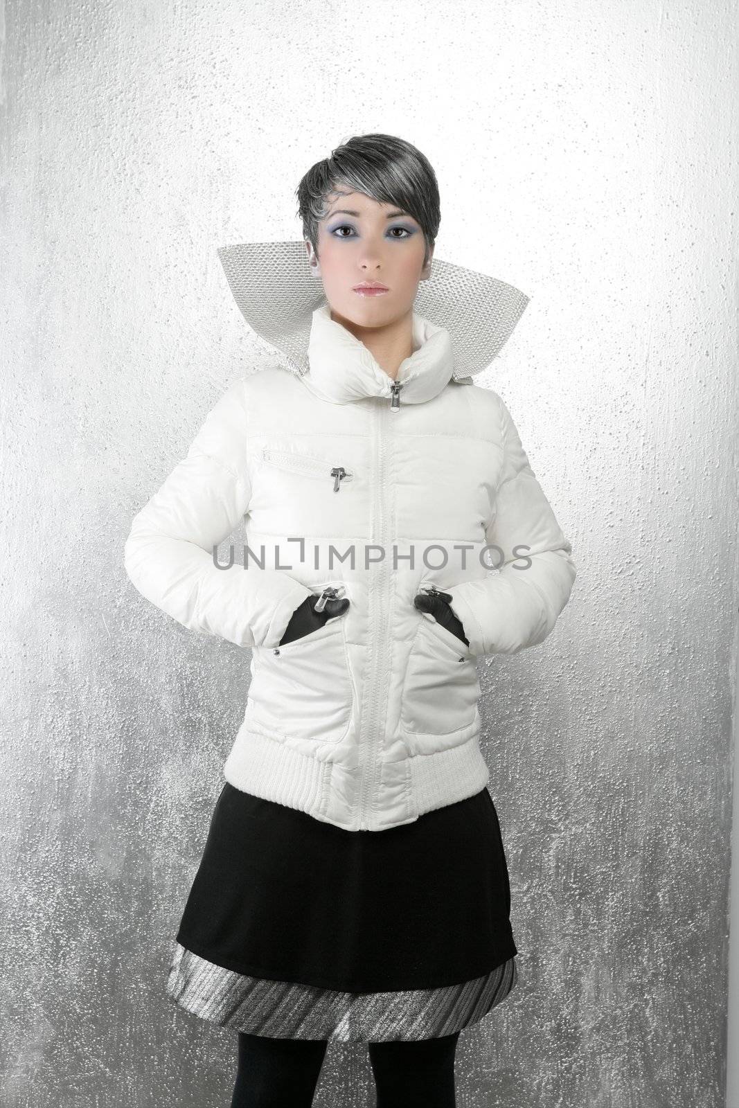 fashion futuristic winter woman look silver background