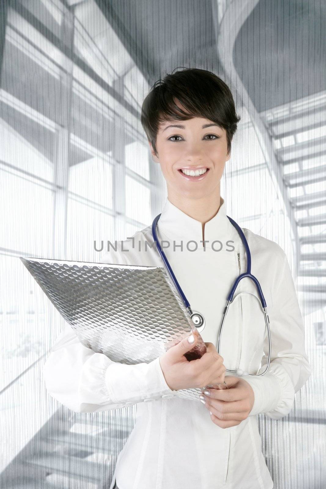 modern future doctor woman stethoscope and silver folder