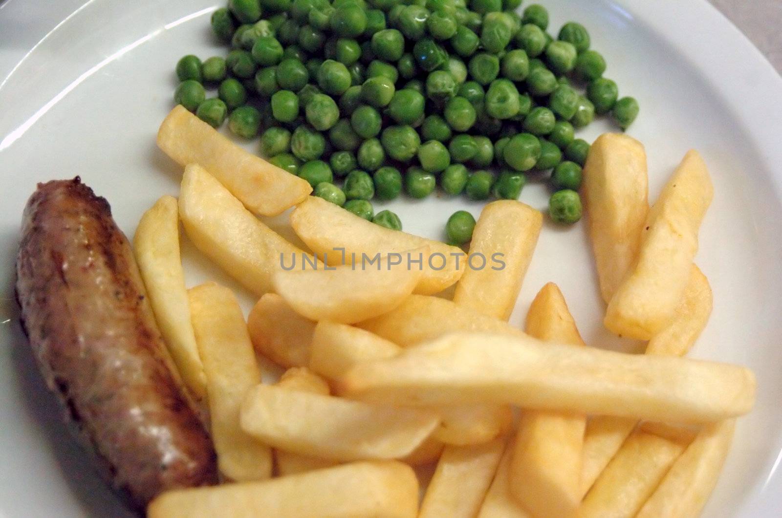 sausage chips and peas typical english kids menu in a pub or restaurant