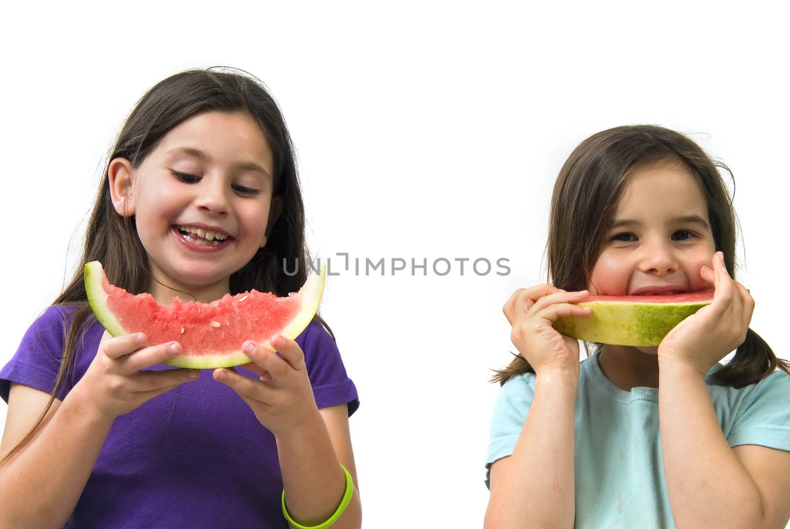 Two girls eating Watermelon isolated on white background