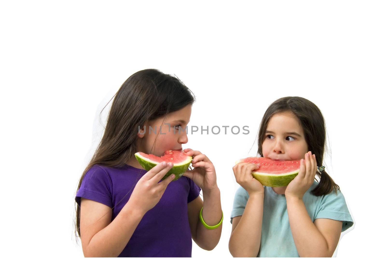 Two girls eating Watermelon isolated on white background