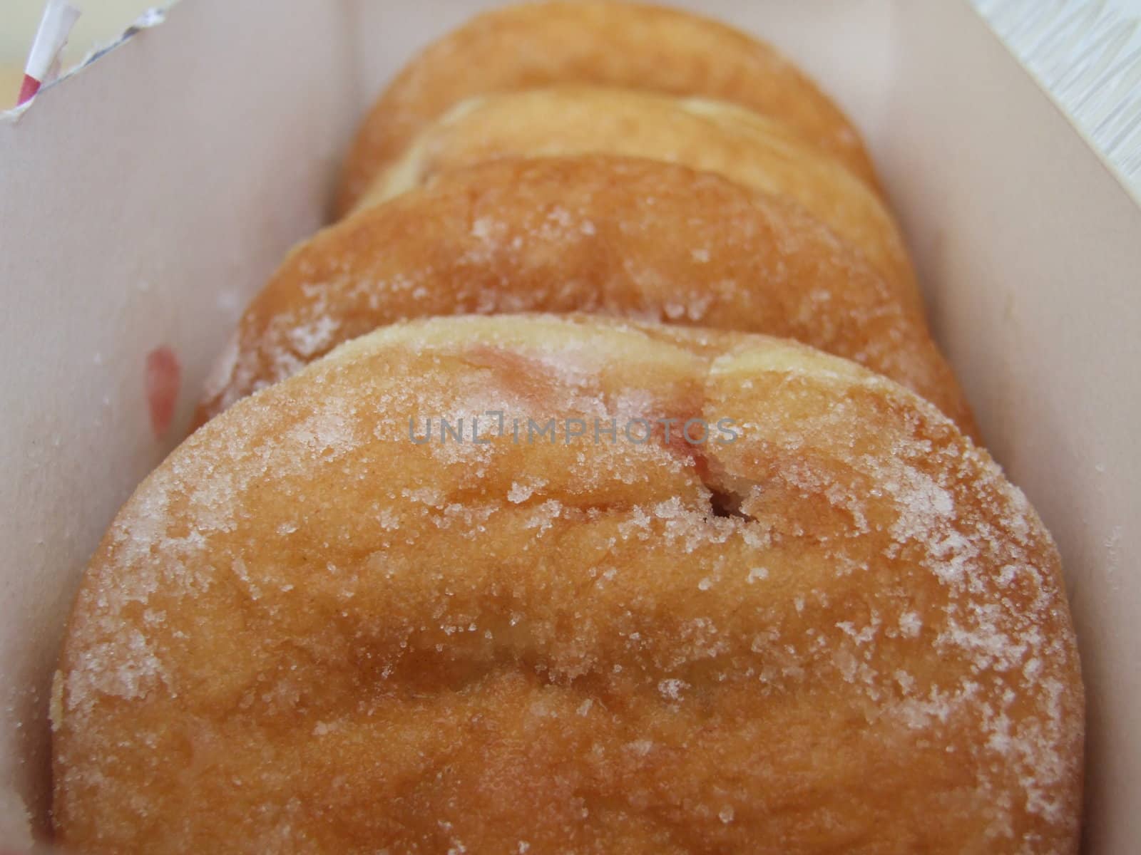 Close up on box of doughnuts