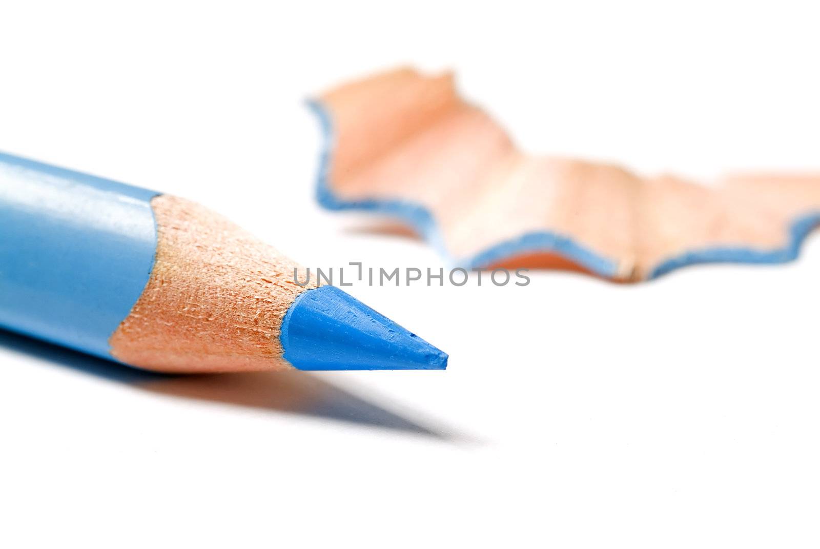 blue pencil and shaving isolated on white