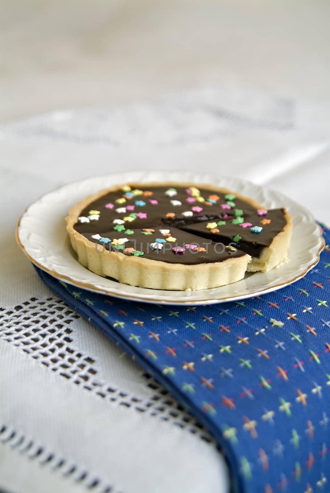 Chocolate Tart with colorful star candies