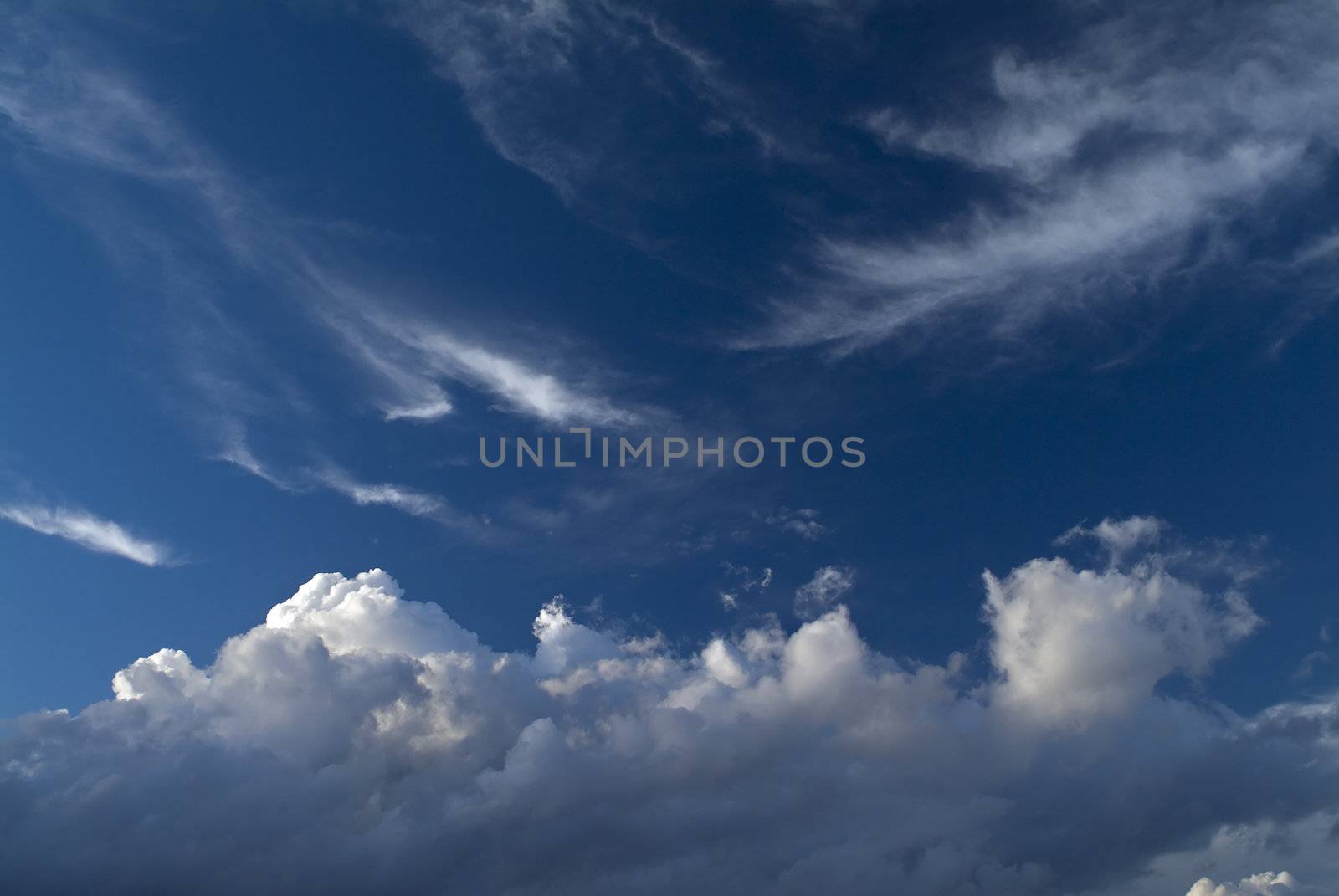 blue sky with dramatic cloudscape with combination of Cirrus and Cumulus clouds