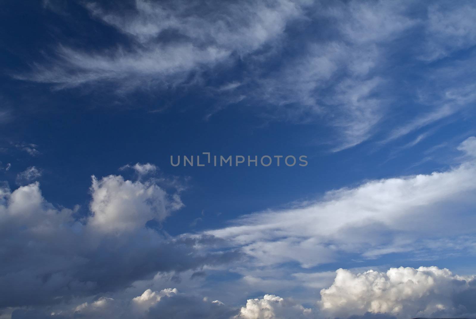 blue sky with dramatic cloudscape with combination of Cirrus and Cumulus clouds