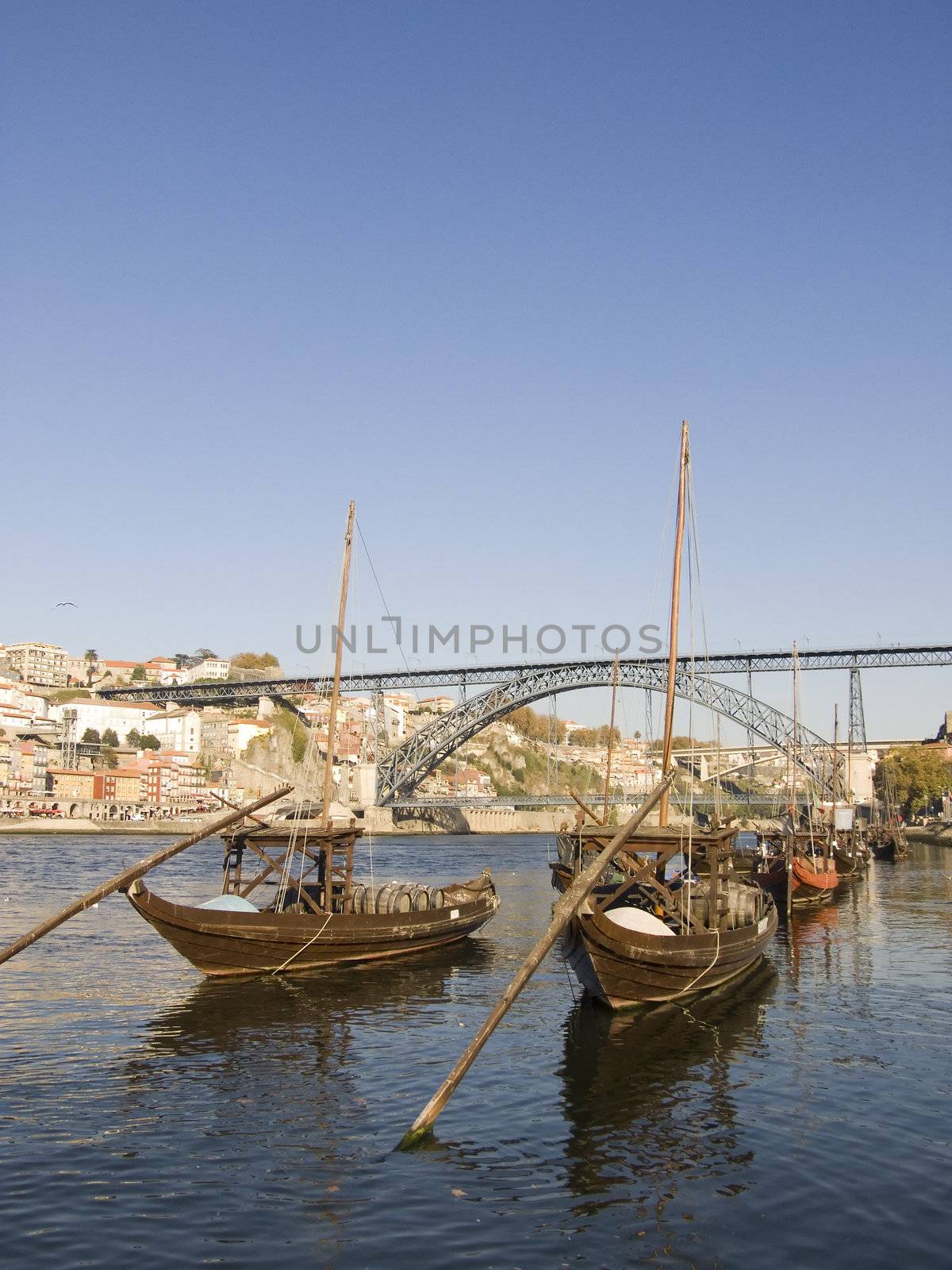 Cityscape with a typical portowine rebelo boat in the forground