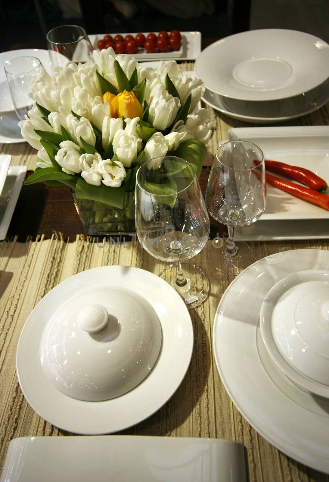 The served table at restaurant with bouquet