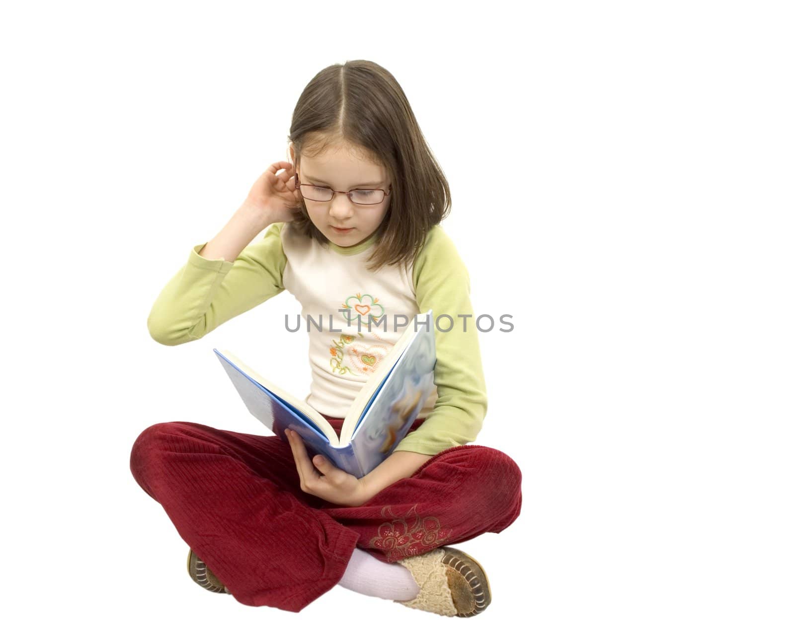 Young girl read book isolated on white background