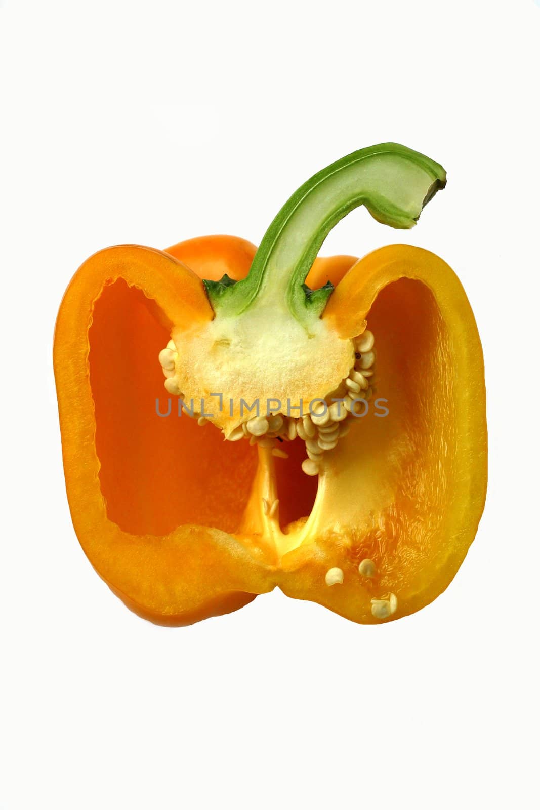 Yellow sweet pepper reduces half-and-half on a white background