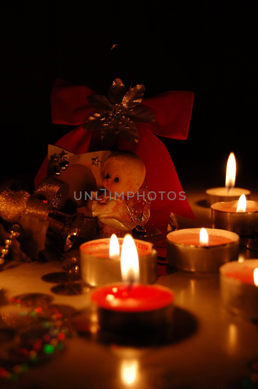 Angel figurine, christmas decoration in cand light