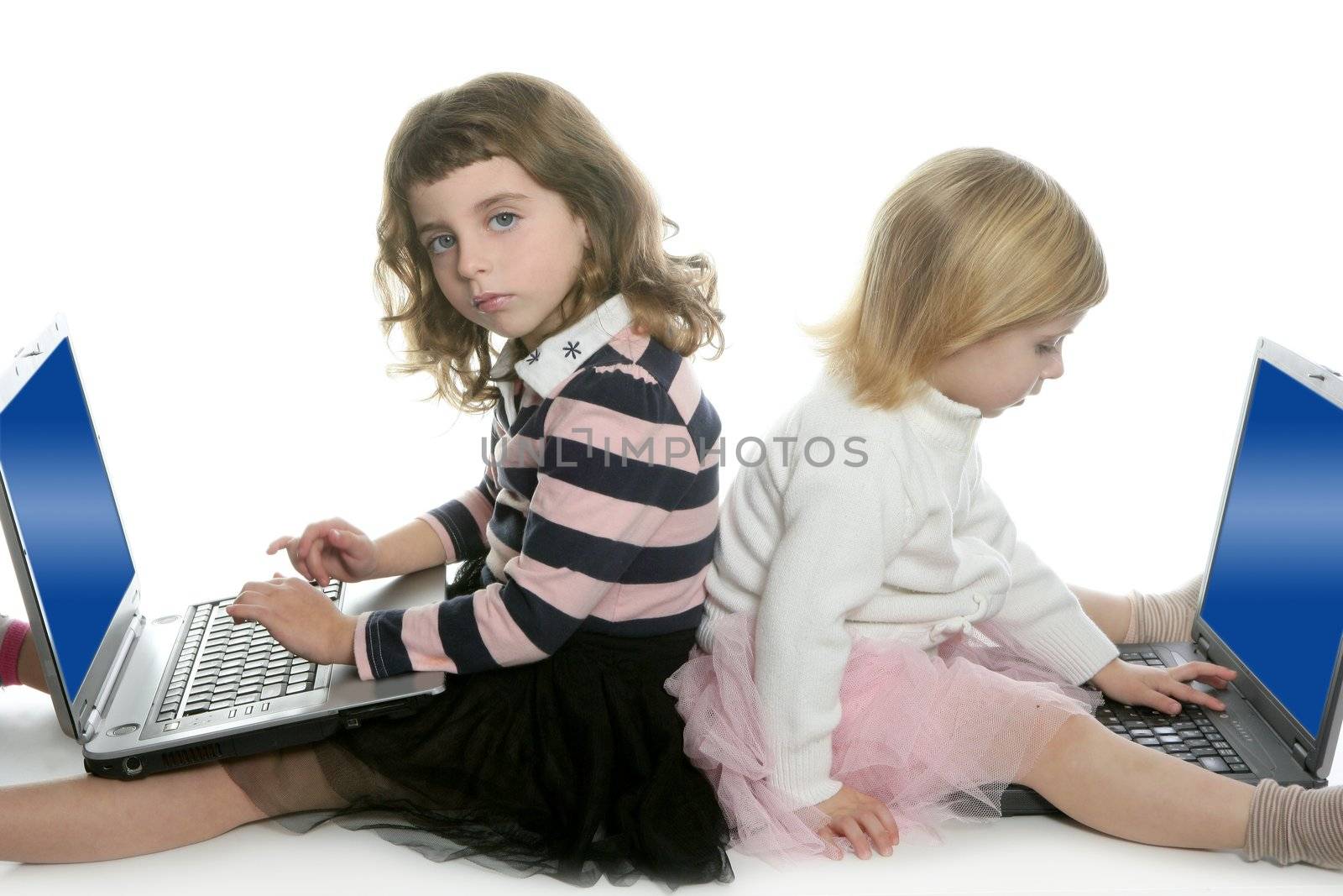 two little girls sister with computer laptops by lunamarina