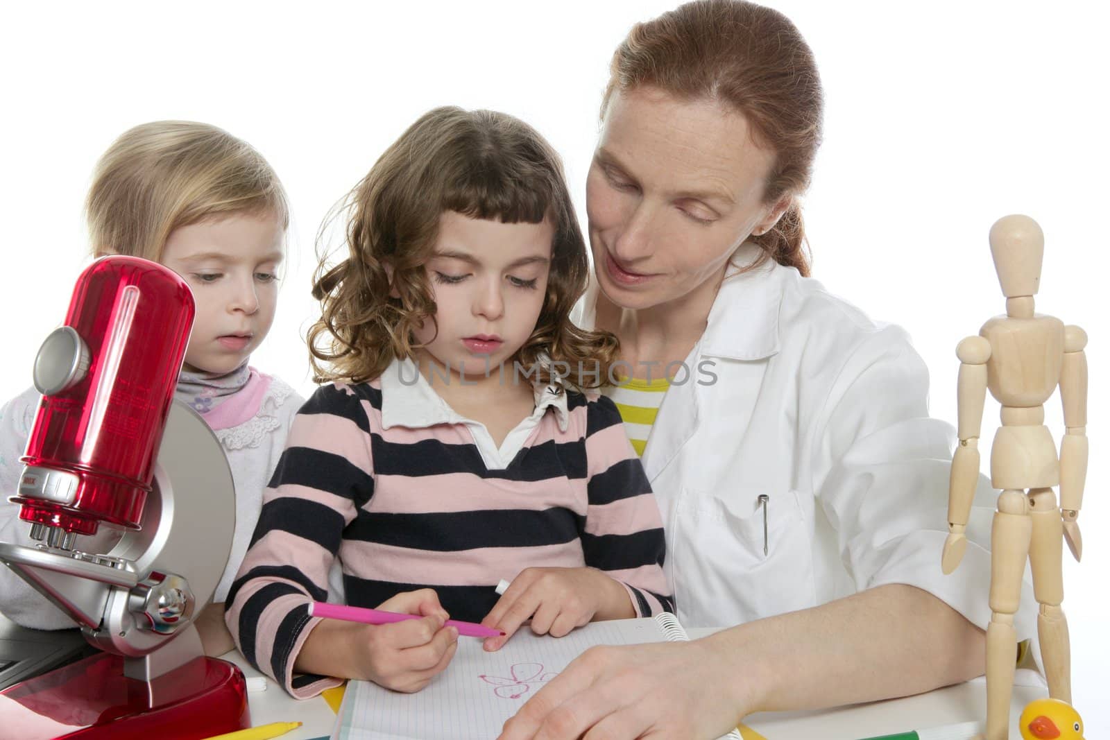 doctor natural sciences teaching pupil at school