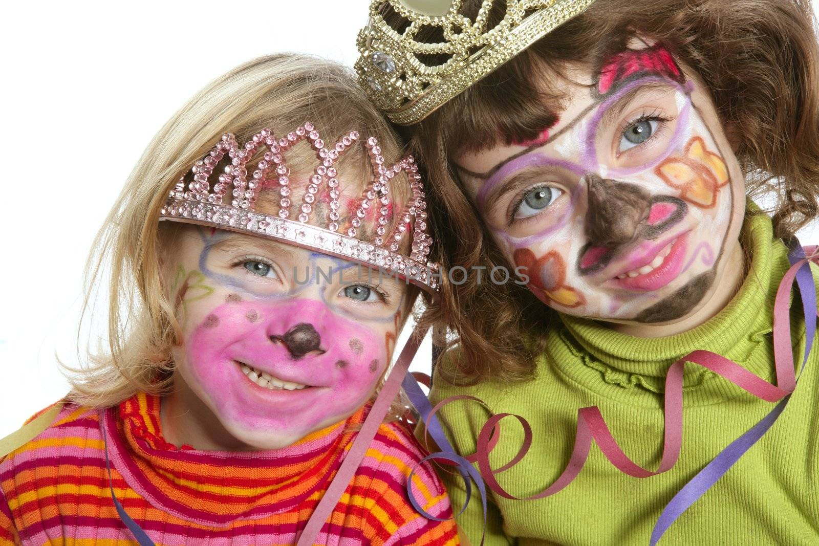 party little two sisters with painted happy face smiling