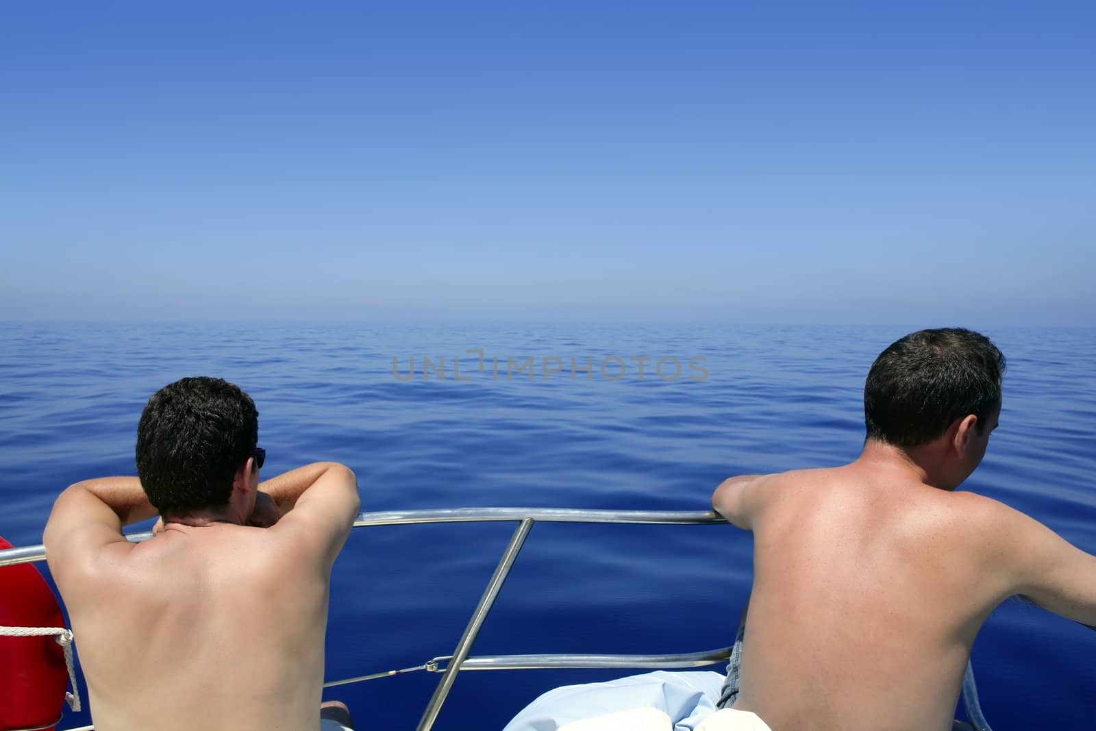 Back view of seascape from boat in blue Mediterranean sea