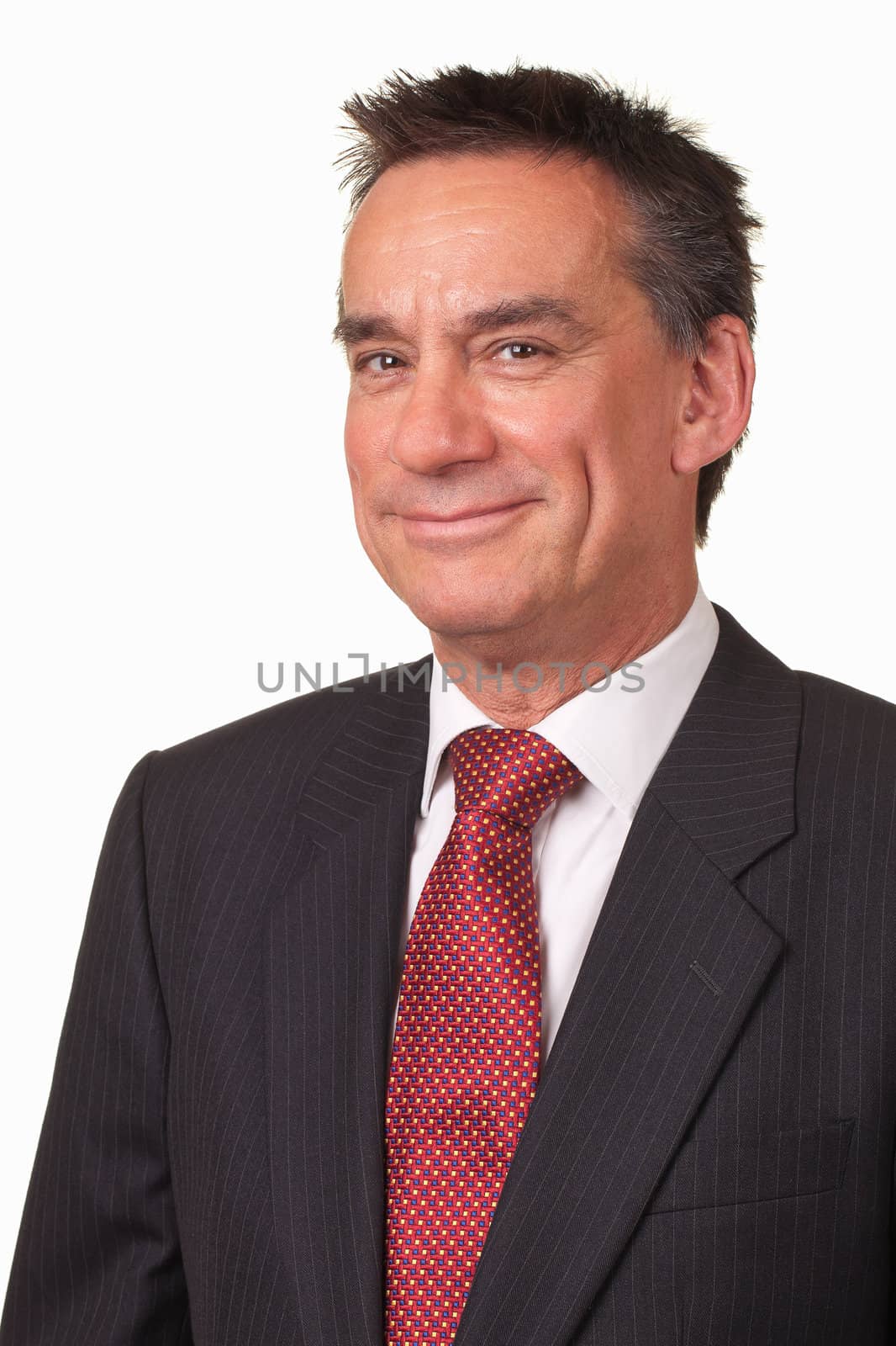 Attractive Middle Age Business Man in Suit with Cheeky Smile Isolated by scheriton