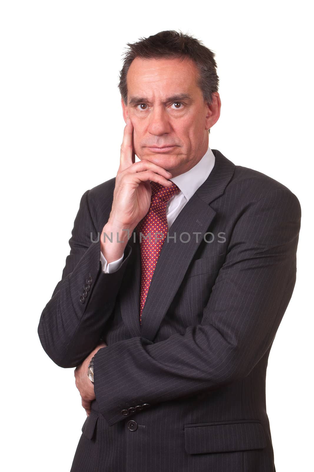 Frowning Angry Middle Age Business Man in Suit with Hand to Face Isolated
