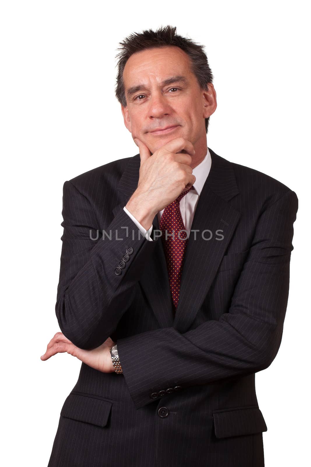 Smiling Business Man in Suit with Hand to Face in Thought by scheriton