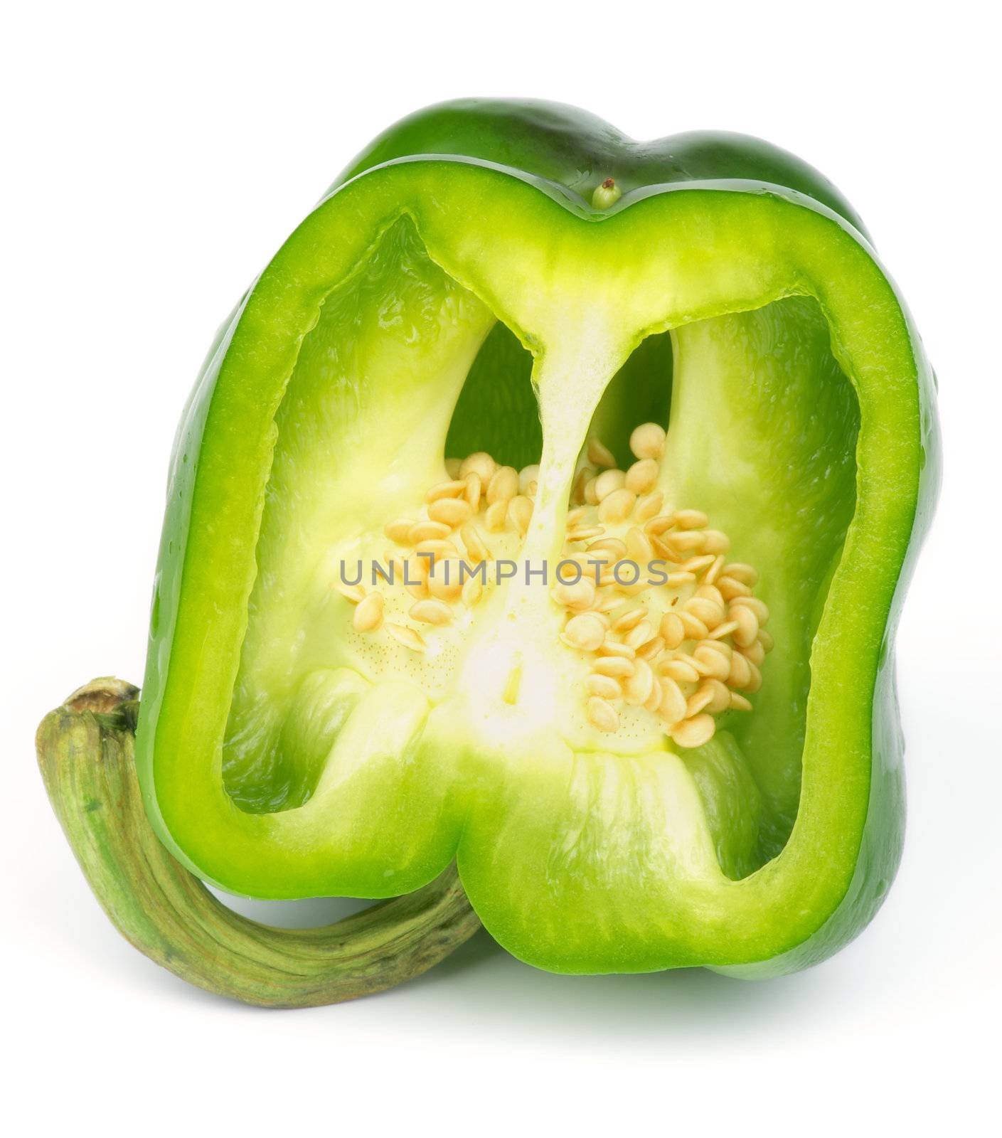 Cut into Half Raw Green Bell Pepper and Seeds isolated on white background
