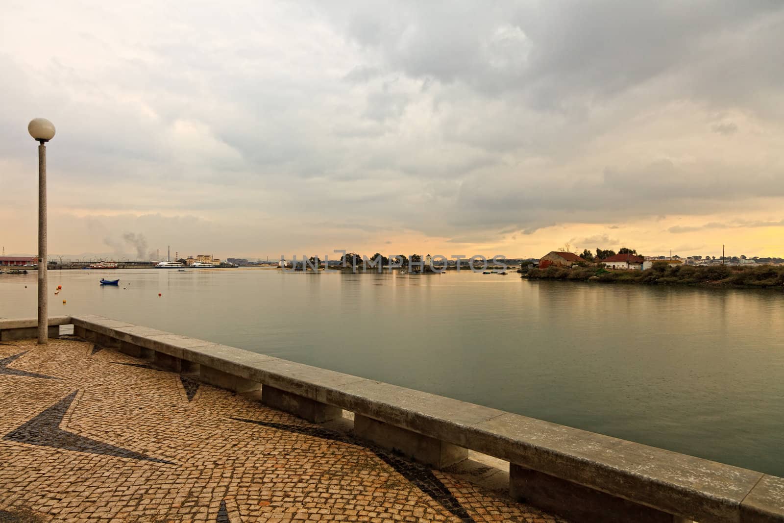 Sunset on the Tejo river with Barreiro mills in background.