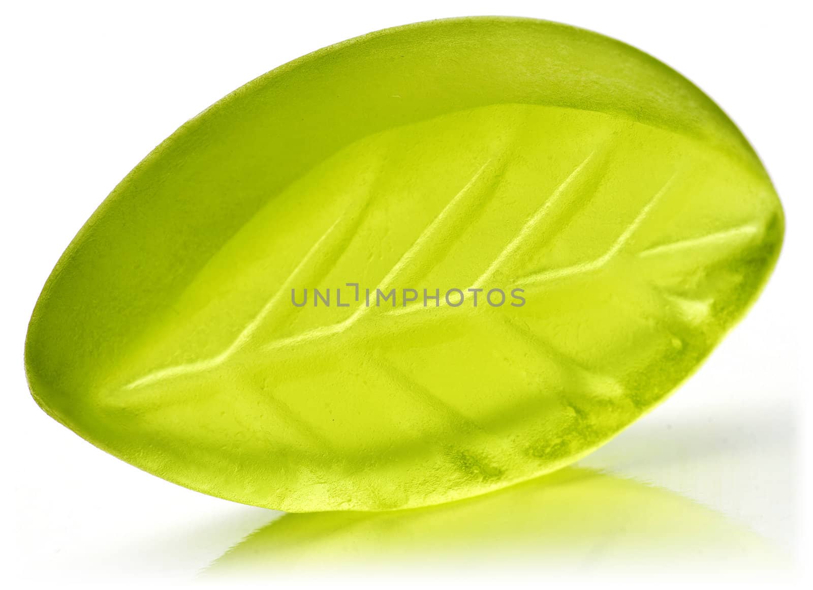 Leaf shaped jelly in green color on white background.