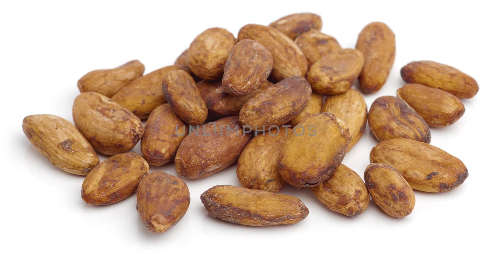 Raw cacao beans isolated on white background