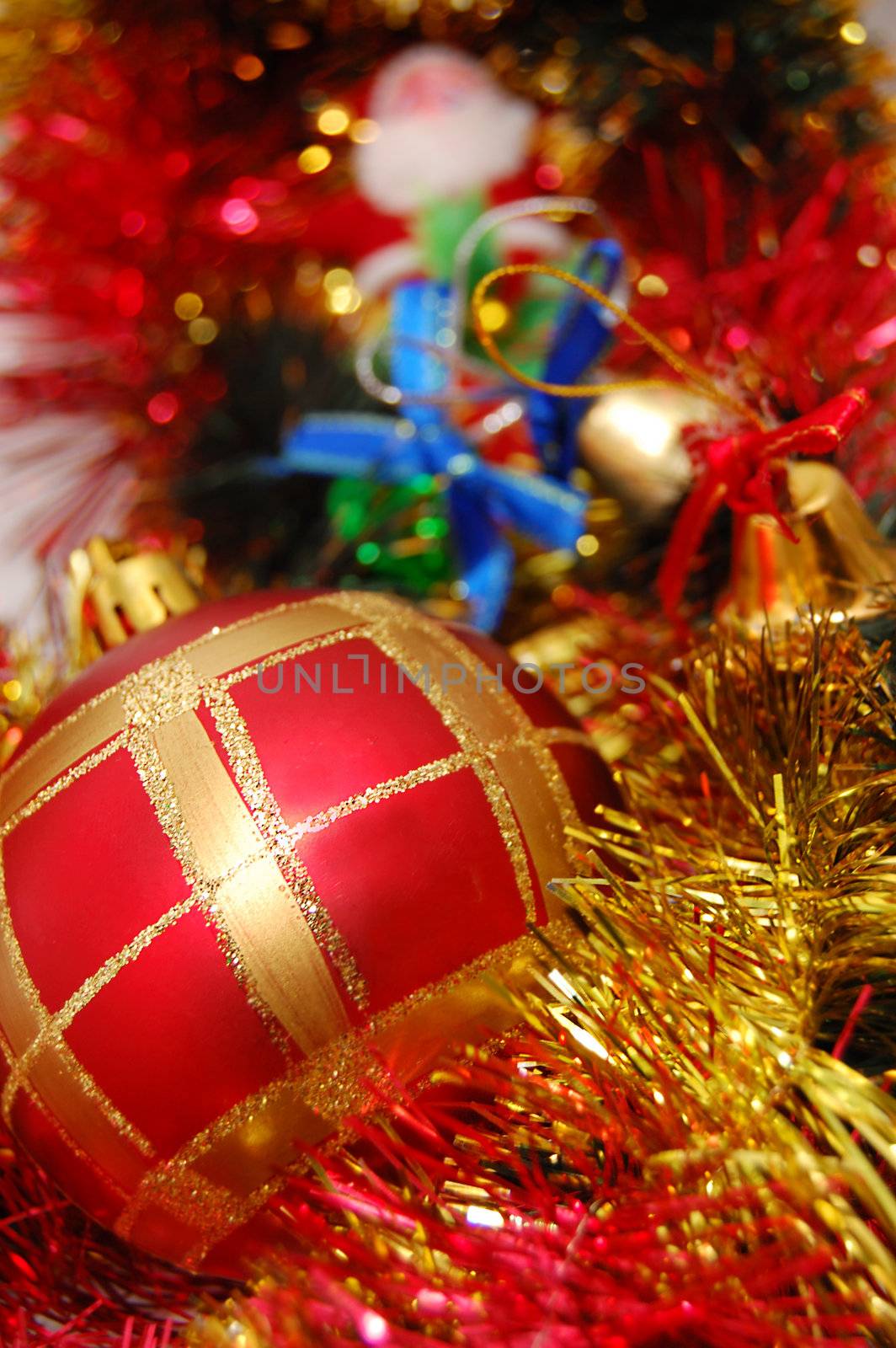 Christmas decoration with ball and tinsel