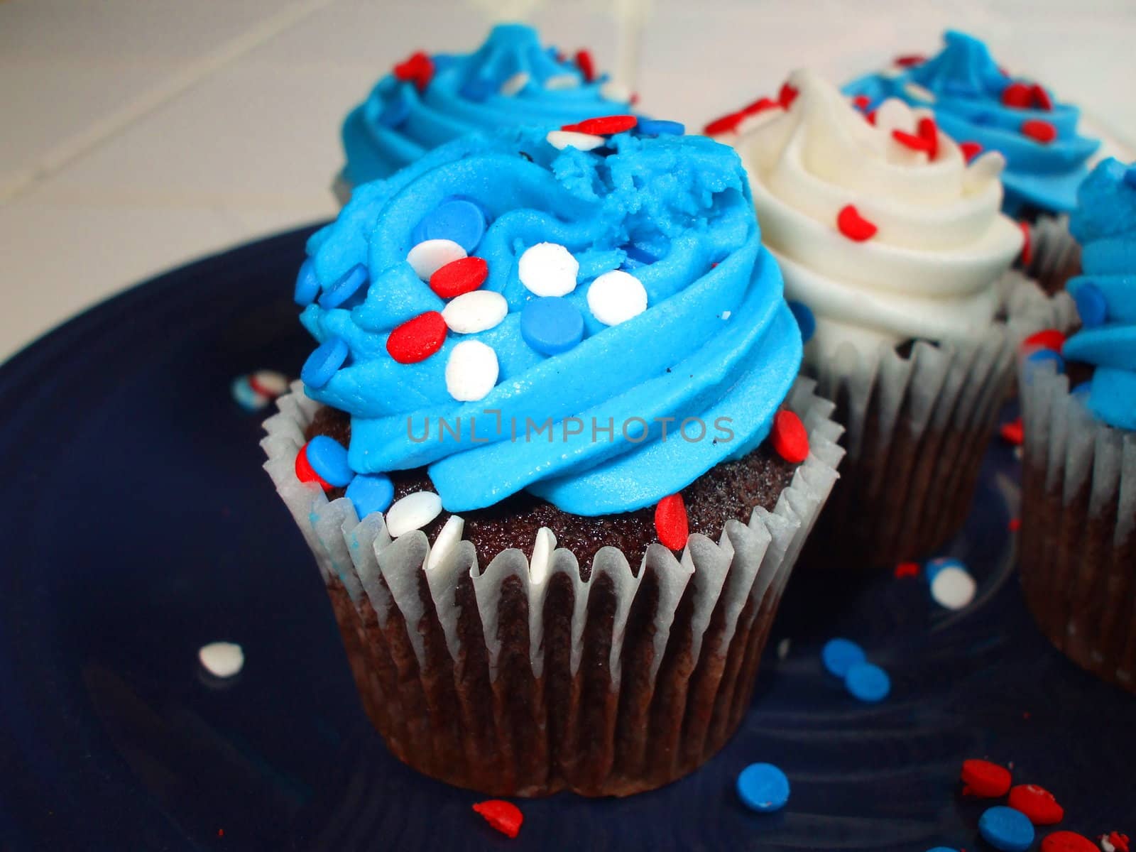 Close up of a group of cupcakes.