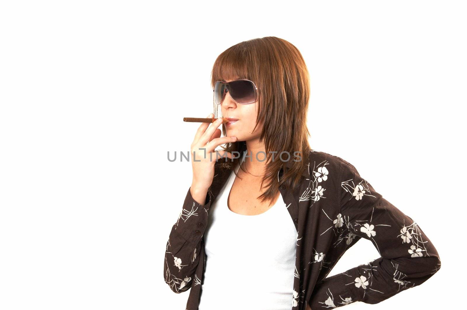 The girl in brown smoking a cigar 