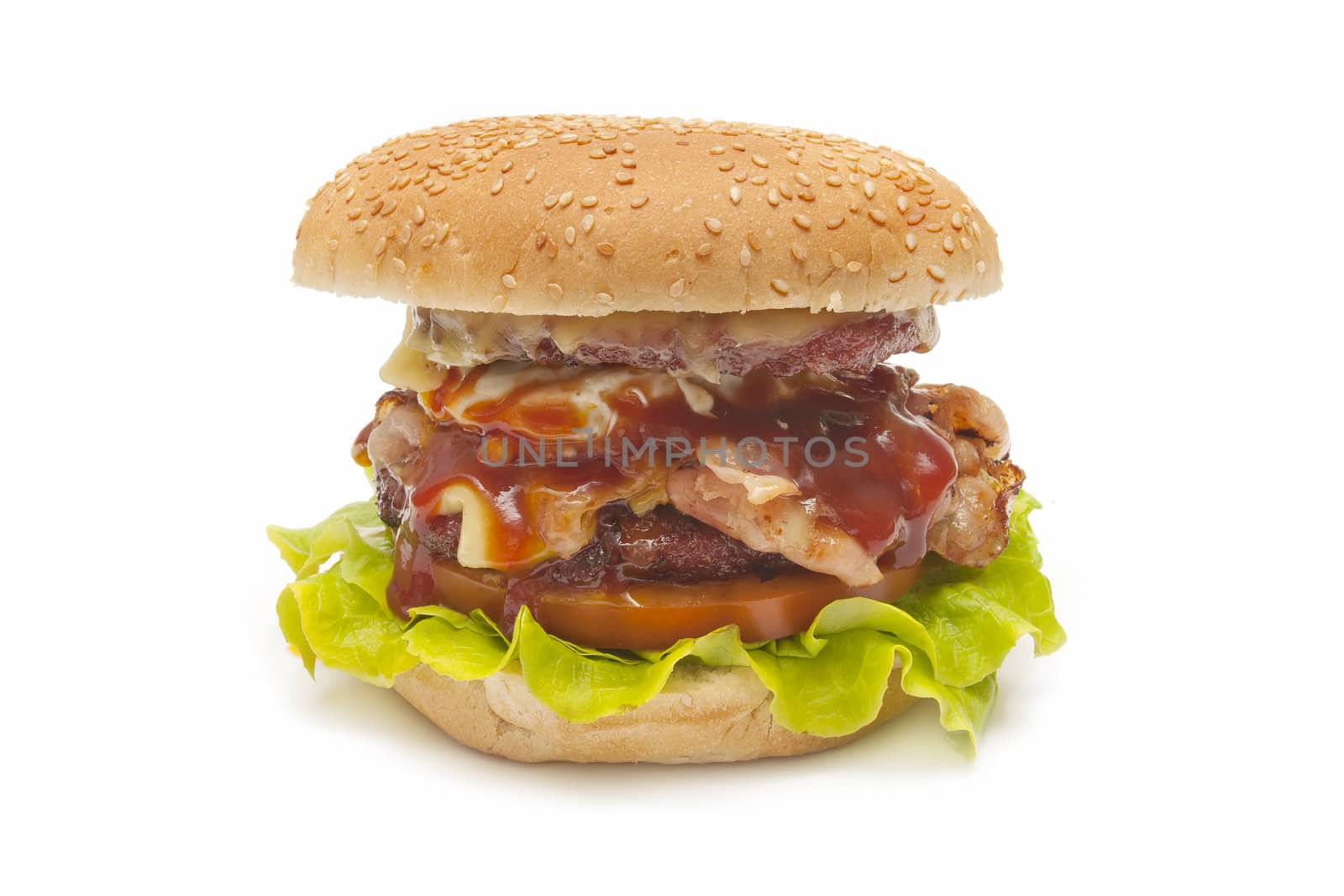 special burger with cheese, tomato, lettuce, meat, eggs, bacon and mustard sauce and tomato
