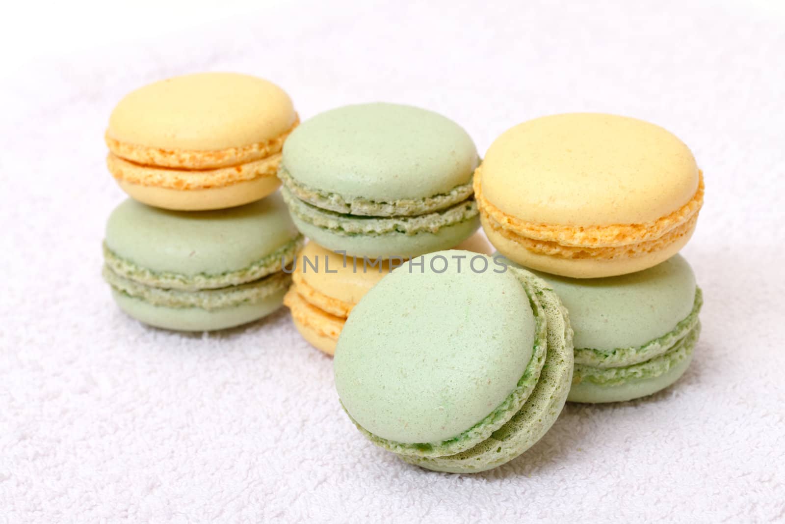 Colorful macaroons on white background