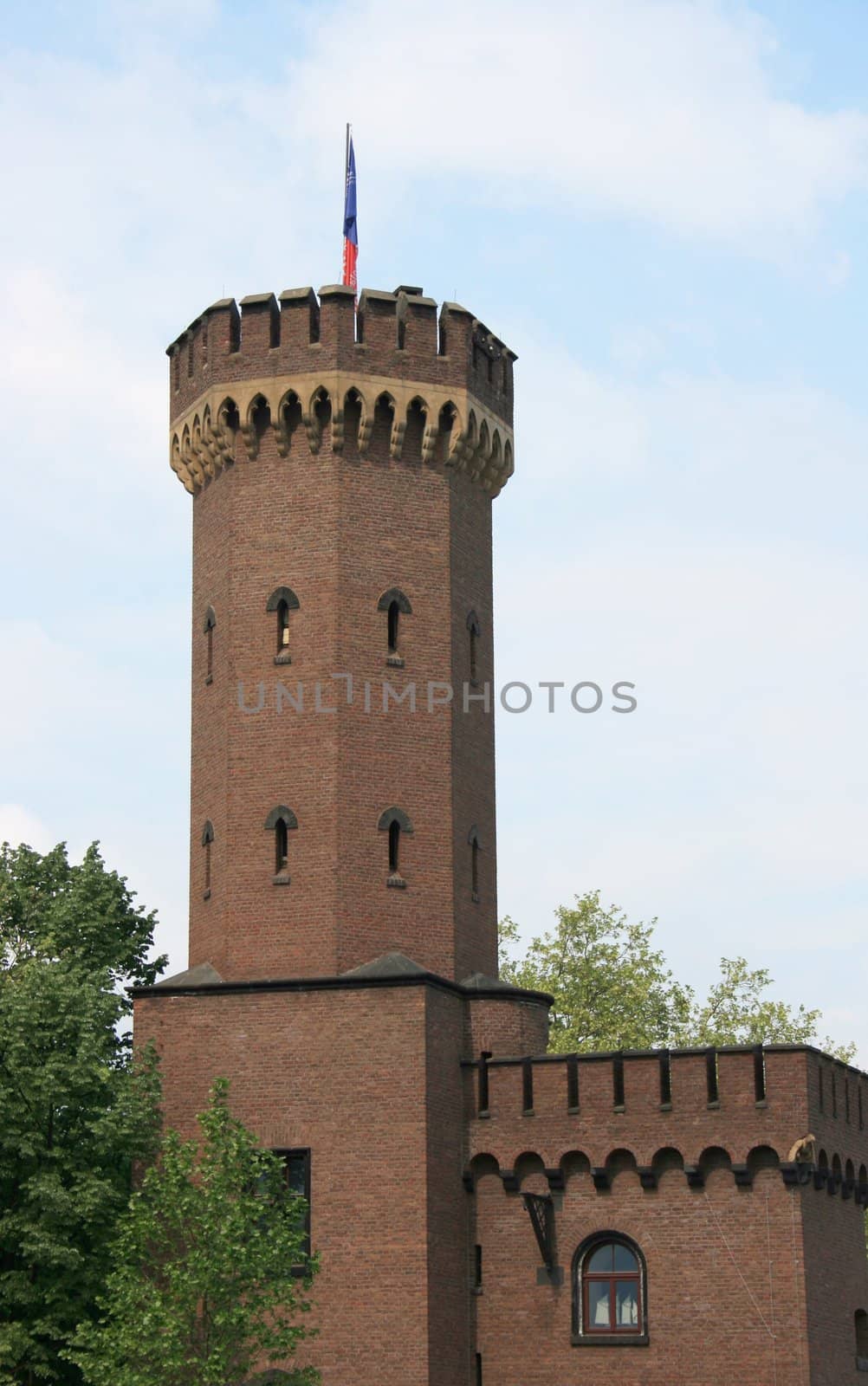 a tower built of red brick stones