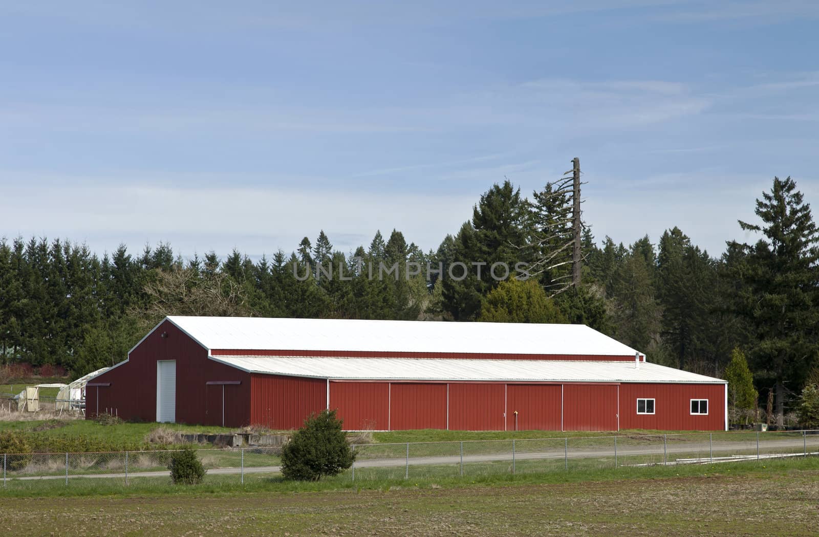 Large red warehouse in rural Oregon.