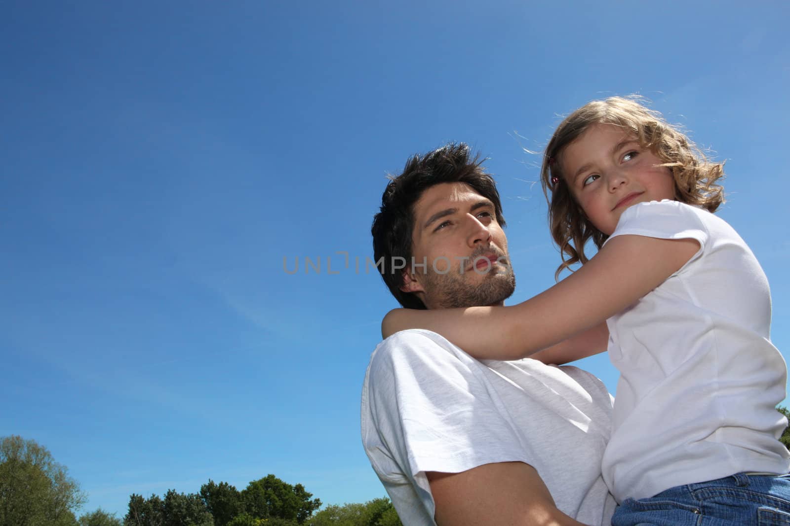 Father and daughter in summer